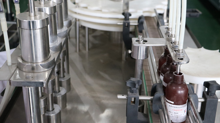 fabrikado 5 galonoj pleniganta maŝino varma vakso pleniganta maŝino saketo akvo pleniganta sigelilon